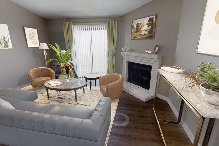 Fully furnished apartment living room with large couch, rug, coffee table, and fireplace.